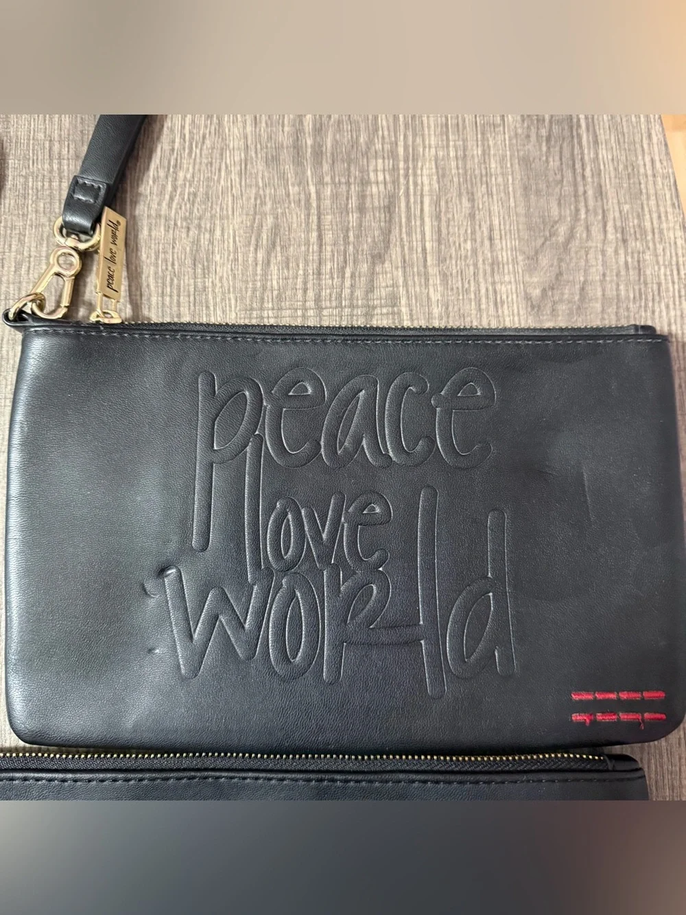 2 Peace Love World Black Embossed Leather Clutch Wristlets